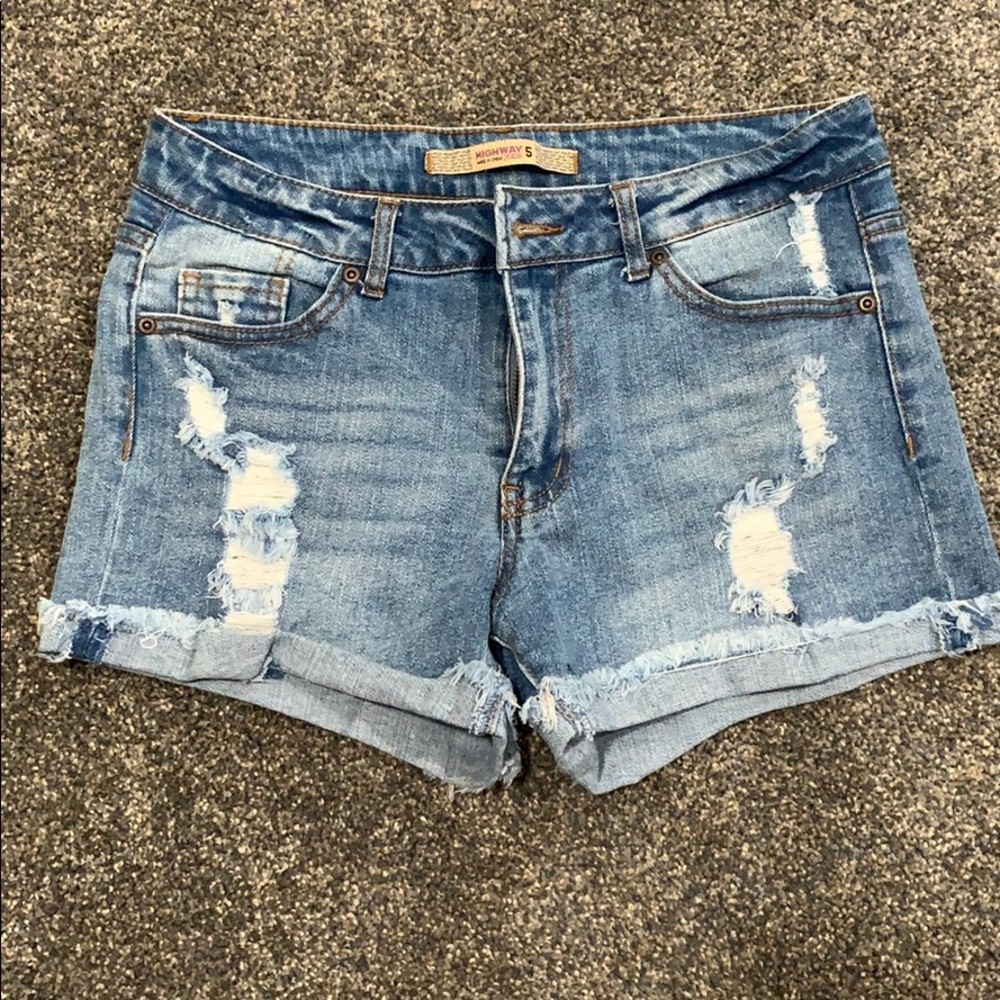 Heavily distressed shorts.